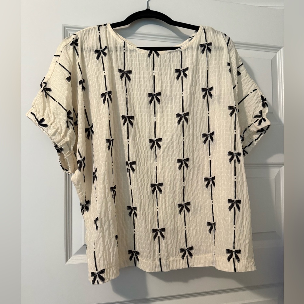 NWT White Top with Black Bow Pattern